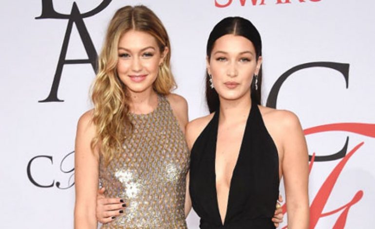 FOTO/ Sport dhe klasike! Dy tifoze si Gigi dhe Bella Hadid do i dëshironte kushdo
