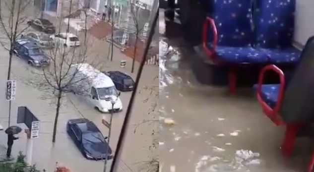 VIDEOLAJM/ Përmbytjet në Durrës, njerëzit deri në brez në ujë ecin mes shiut, shihni ç’ndodh brenda urbanit