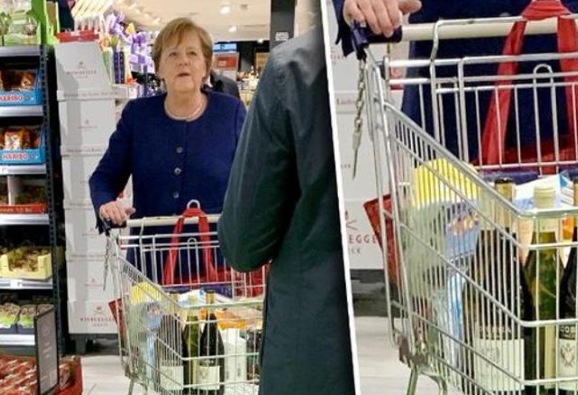 KORONAVIRUSI/ Merkel jep shembullin e mirë, mban radhë në supermarket. Blen edhe verë italiane