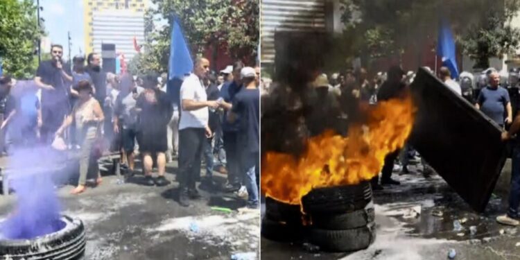 NDODH SËRISH/ Opozita djeg sërish goma në qendër të Tiranës, protestuesit i merr flakë këmisha…